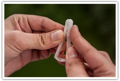 Tick removing spoon for an infection free removal